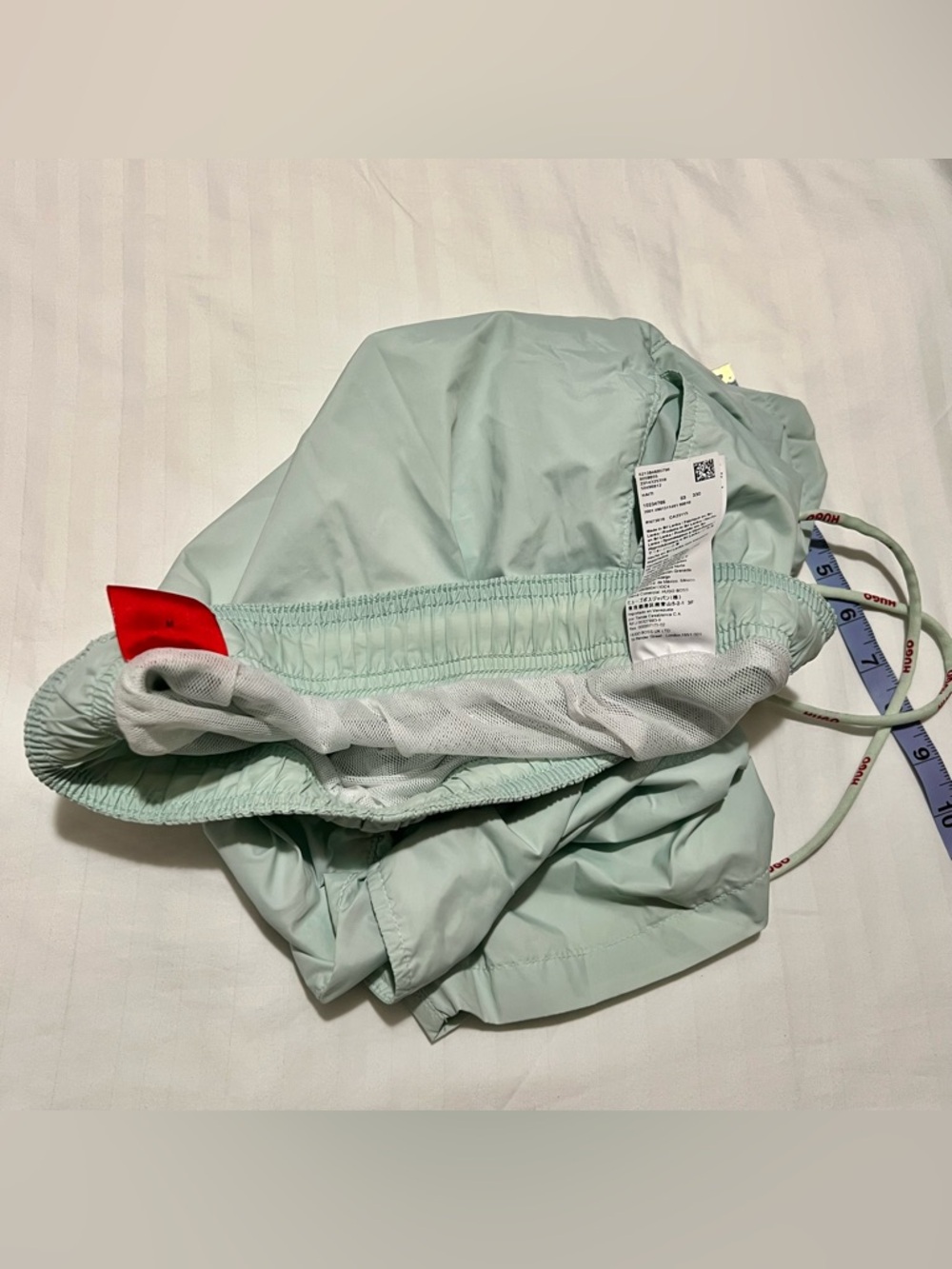 HUGO Light Mint Green Swim Shorts with Red Logo - Picture 8 of 8
